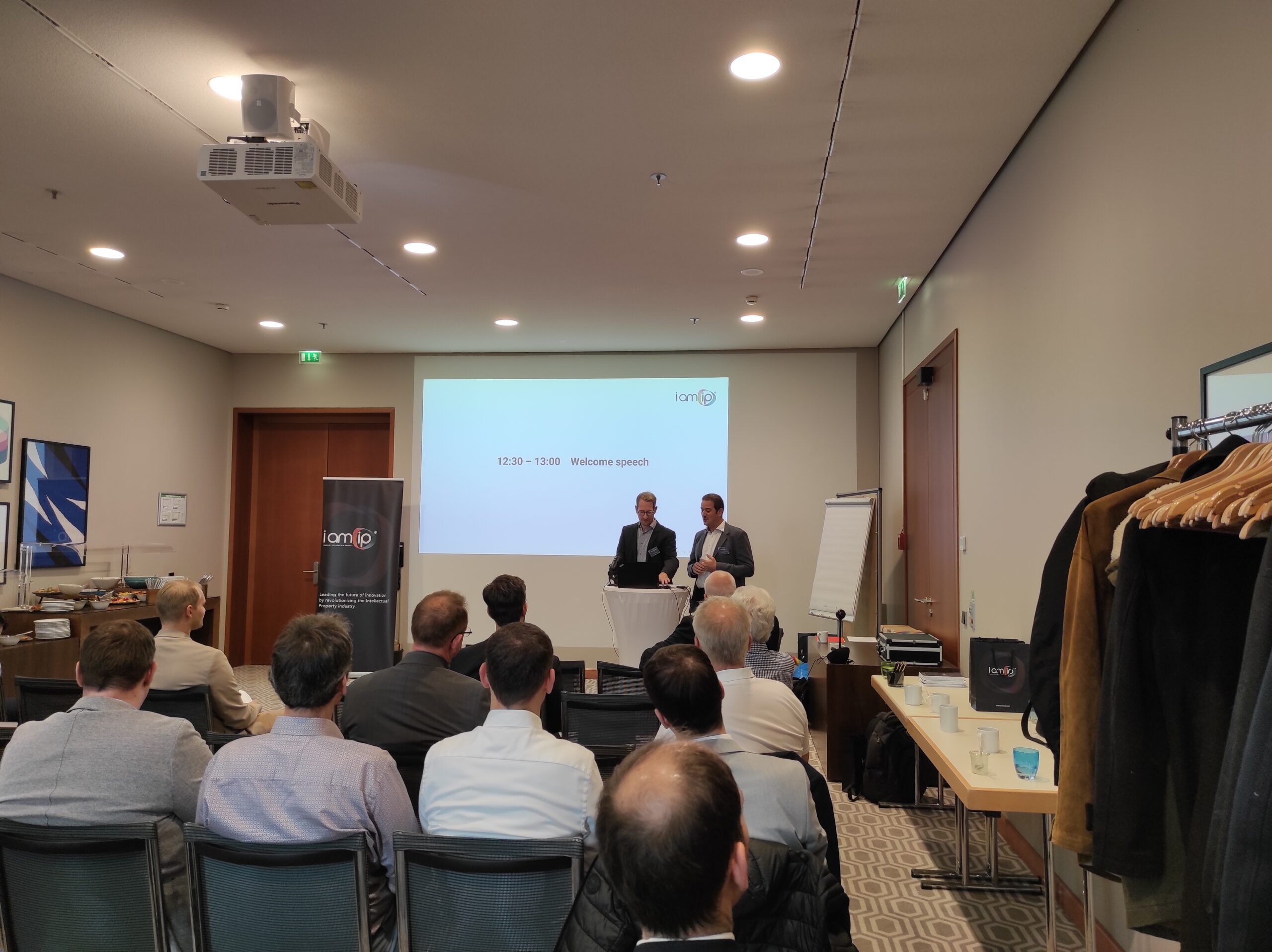 image of Viktor Rudolf and Dimitris Giannoccaro speaking at IamIP User Day Conference 2022