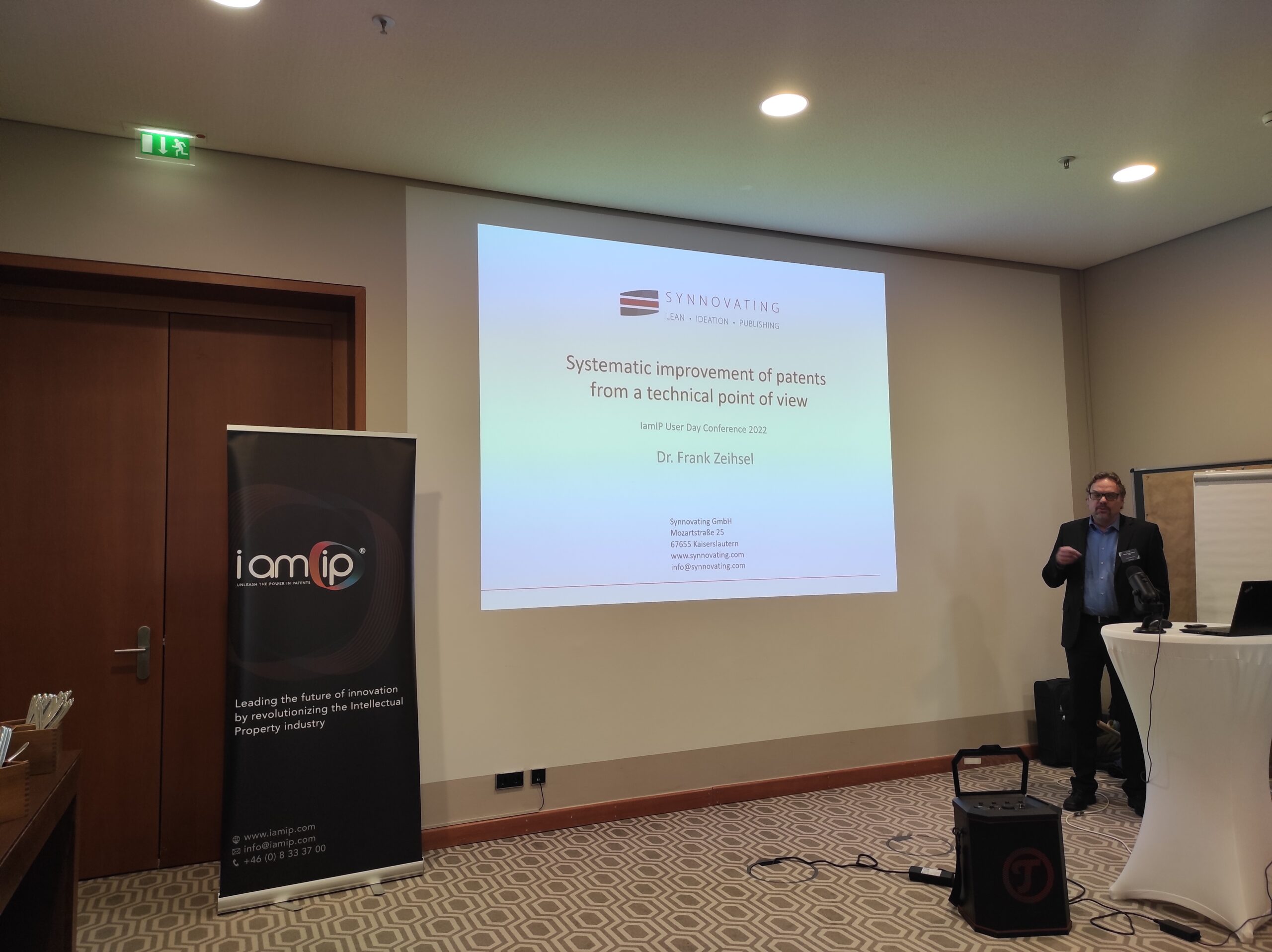 image of Dr. Ing. Frank Zeihsel, from Synnovating presenting about the systematic improvement of patents