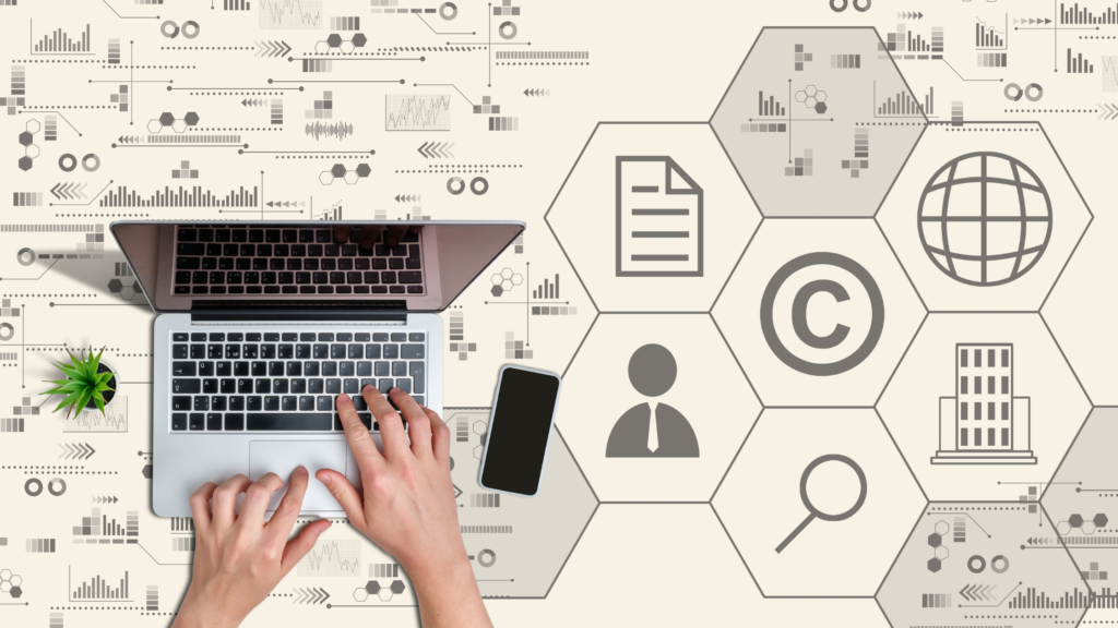 an image of a laptop and the sign of a copyright